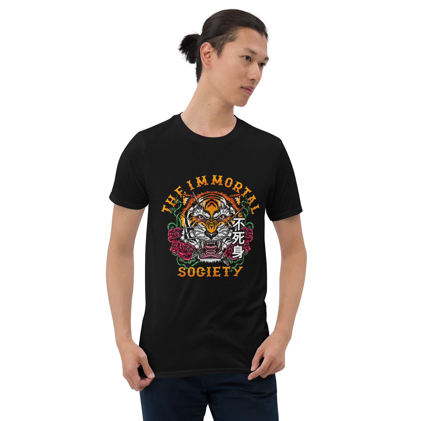 A slender Asian man with a short pony tail wearing The Immortal Tiger t shirt in black by The Immortal Society. He is standing showing the front of the shirt. 