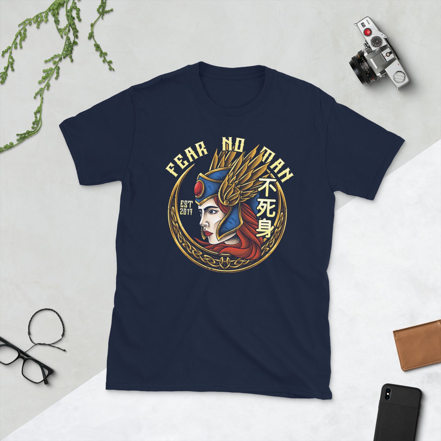 A navy t shirt on display with The Valkyrie design on it by The Immortal Society. 